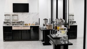 a room with a counter with glasses on it at Regent Heights Hotel in Johannesburg