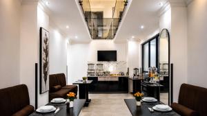 a living room with a couch and a table at Regent Heights Hotel in Johannesburg