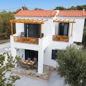 a villa with a view of a house at VILLA MIPA Samos in Kámpos