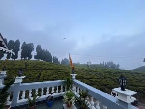 a view from the balcony of a house at Rangdu Homestay in Darjeeling
