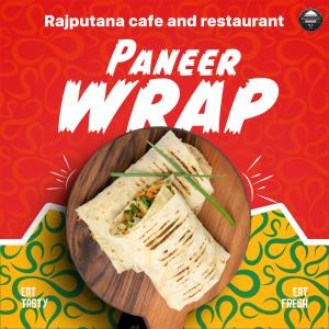 a book cover of a sandwich on a wooden plate at Rajputana cafe and restaurant in Dausa