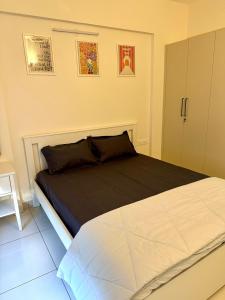 a bedroom with a large bed in a room at North scape 104 in Bangalore