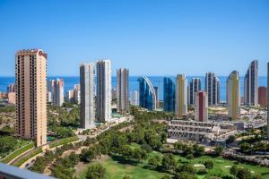 an aerial view of a city with tall buildings at Skyline Infinity Apartment Eagle Tower Benidorm in Benidorm
