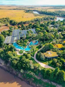 an aerial view of a solar farm next to a river at Pristine Mara Bay Lodge in Masai Mara