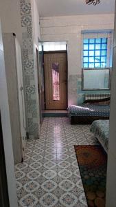 a room with a hallway with a door and a floor at Номер у моря, бассейн, сад, мангал in Odesa