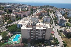 an aerial view of a city with a building at Golden Moon Apart Hotel in Kuşadası