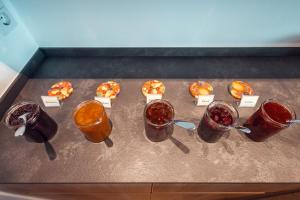 a bunch of different types of food on a table at Gass-Hof in Caldaro