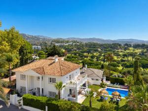 an aerial view of a house with a swimming pool at Aurora Boutique - Only Adults in Marbella +66 photos