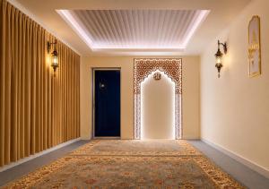 a hallway with a door and a rug at Paradise Resort Langkawi in Pantai Cenang +32 photos
