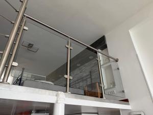 a large mirror on a wall in a room at Appartamenti Lago di Como in Valbrona