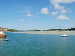 a large body of water with boats in it at Fistral in Saint Merryn