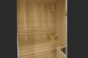 a sauna with a basket in the middle of it at A25 Premium Hotel - 16 Miếu Đầm in Hanoi
