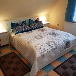 Postel nebo postele na pokoji v ubytování Haus Stricker