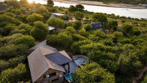 an aerial view of a house in the trees at Nghala Self-catering Holiday Home in Marloth Park