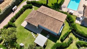 an overhead view of a house with a roof at Ville D'Ogliastra in Cardedu