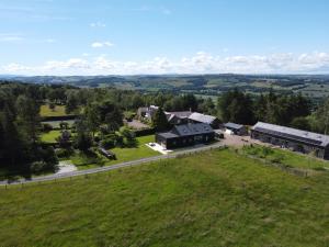 an aerial view of a farm with a building at East Barn Bed & Breakfast in Wall
