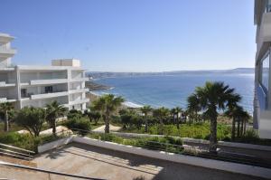 a view of the ocean from the balcony of a building at Meditranee Sea View in Tangier