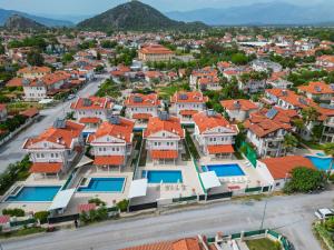 an aerial view of a residential neighborhood with houses at villa hazar in Ortaca