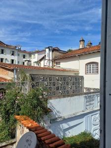 a view of a city from a balcony of a building at Mezanino 131 in Ouro Preto