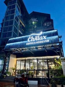 a building with a sign on the front of it at Chillax in Ha Long