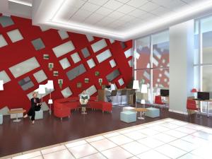 Uma área de estar em Ibis Cancun Centro
