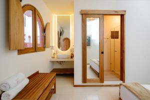 a bathroom with a sink and a mirror at Hotel Casa Eteca in San Pedro y San Pablo Etla +76 photos