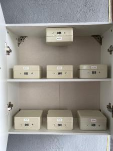a shelf with boxes sitting on top at AK Greenrise Meru in Ipoh +36 photos