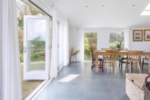 a dining room with a table and a dining room at Ty Top in Newport