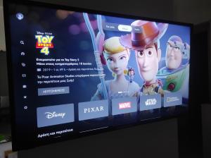 a television screen with toy story on it at Stone apartment in Chalkida