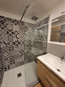 a bathroom with a shower and a sink at Casa Cris SoleAlto in Marilleva +12 photos