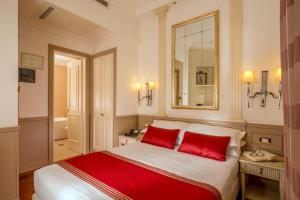 Postel nebo postele na pokoji v ubytování Hotel Villa Glori
