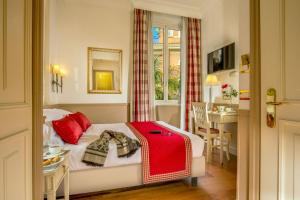 Postel nebo postele na pokoji v ubytování Hotel Villa Glori