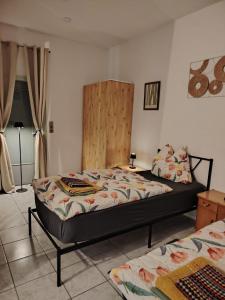 a bedroom with two beds in a room at Studio Kyllburg-Eifel in Kyllburg