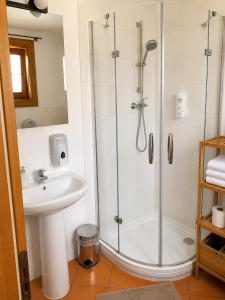 a bathroom with a shower and a sink at Drevenica Podkovička - Terchová in Terchová +19 photos