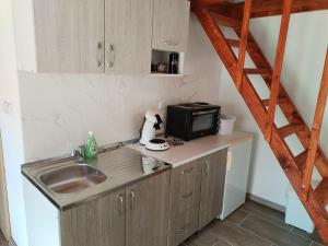 Nhà bếp/bếp nhỏ tại Adea's home