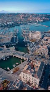 an aerial view of a harbor with boats in the water at Casa Noal - a due passi da Ortigia e dal mare in Syracuse