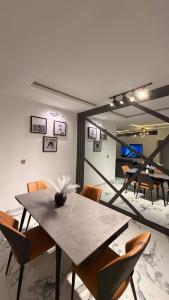a dining room with a table and chairs at The bliss spot in Lekki