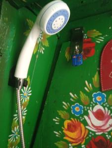 a telephone sitting on top of a green table at Small Rosie River Glamping Pod for 1 in Lincoln +8 photos
