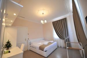 Ein Bett oder Betten in einem Zimmer der Unterkunft Villa Zaccardi