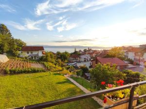 a view of a town from the balcony of a house at Villa Hristina in Elshani