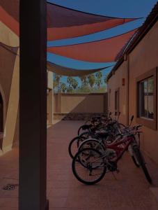 a group of bikes parked in a building at Loreto Playa Boutique Hotel in Loreto