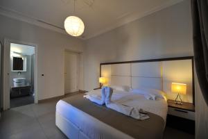 Ein Bett oder Betten in einem Zimmer der Unterkunft Villa Zaccardi