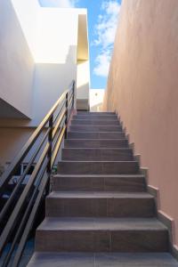 a staircase leading up to a building with the sky in the background at Estudio Ideal con todo lo necesatio in La Paz