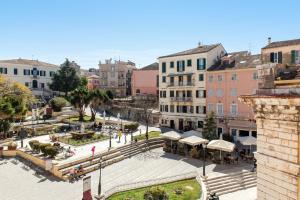 a view of a city with buildings and a plaza at Guilford Loft in Corfu