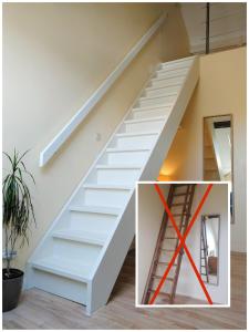 a white stair case in a house with a red triangle at B&B De Schorre in Boom