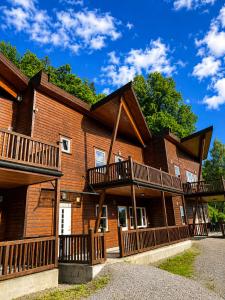 a building with balconies on the side of it at Olavsberget camping in Porsgrunn