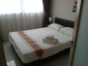 Postel nebo postele na pokoji v ubytování Water Park Unit + 13 fotografií