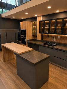 a kitchen with a sink and a counter top at Reserva Itay in Luque