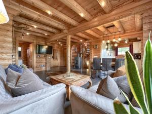a living room with couches and a table at Bavaria in Teunz