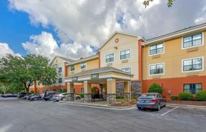 a hotel with cars parked in a parking lot at Extended Stay America Suites - Charleston - Mt Pleasant in Charleston